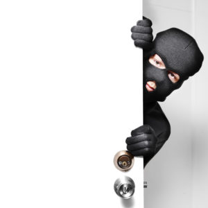 A masked man hiding from the door - business personal property tax